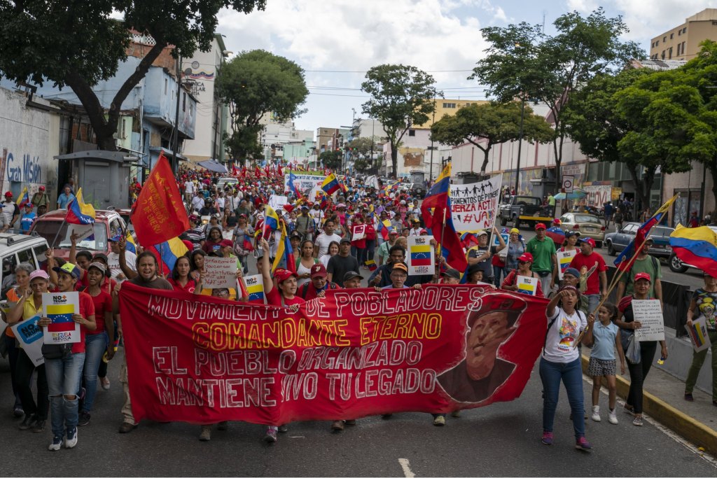 Venezuela-no-more-Trump-march-Chavez-banner.jpg