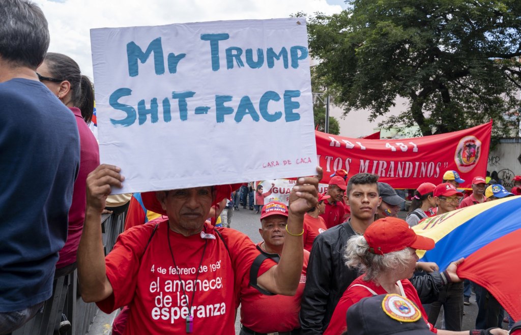 Venezuela-no-more-Trump-march-shit-face.jpg
