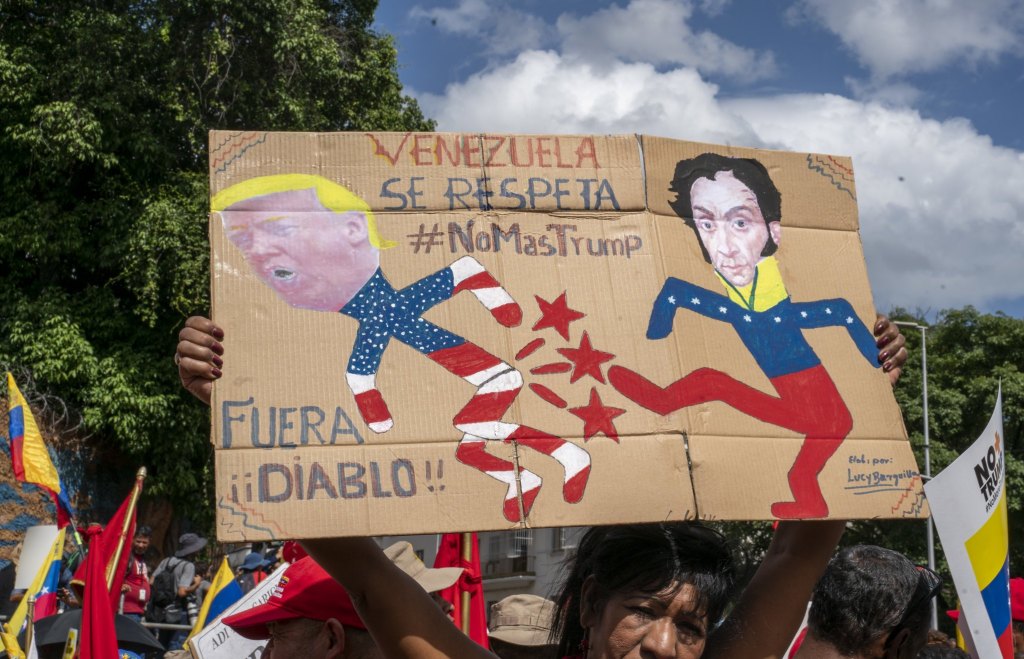 Venezuela-no-more-Trump-protest-Bolivar-kicking.jpg