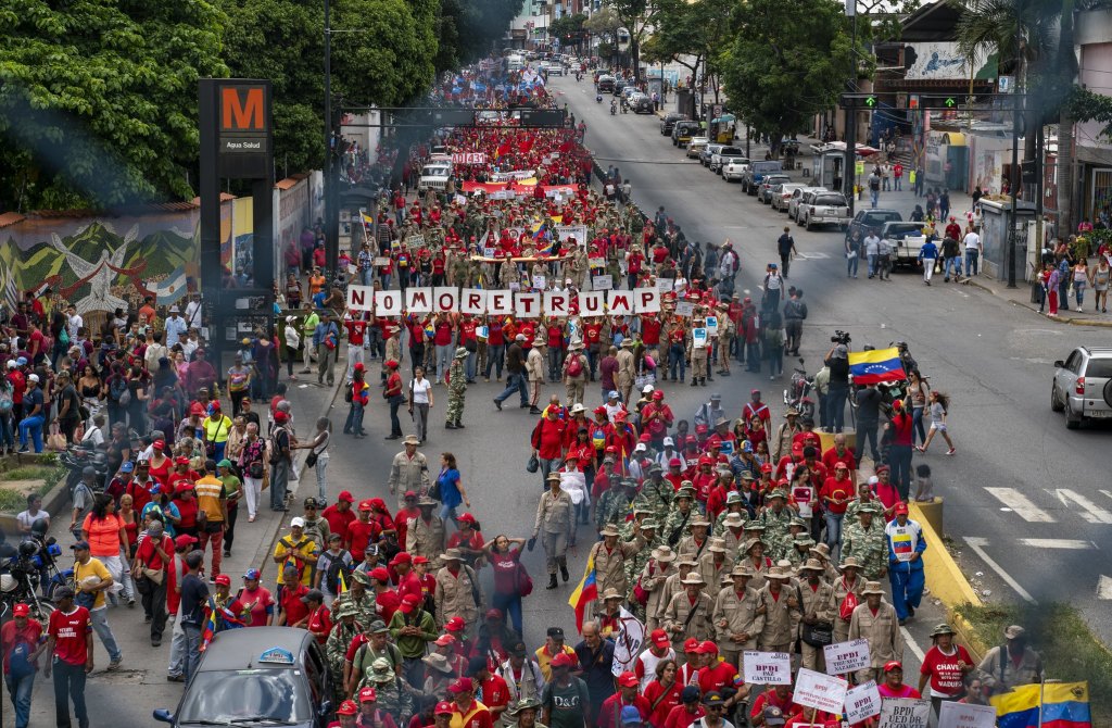 Venezuela-no-more-Trump-protest-signs-fence.jpg