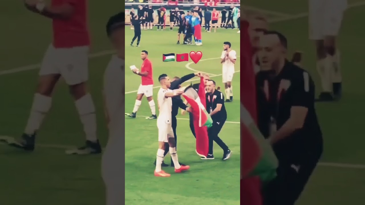 Moroccon player Jawad El Yamiq raises Palestinian FLag after final whistle against 🇨🇦