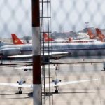 an_airplane_with_the_russian_flag_is_seen_at_simon_bolivar.jpg_1718483346