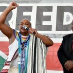 president_cyril_ramaphosa_xrx_watches_a_traditional_healer_at_the_freedom_day_national_commemoration_in_makhandax_south_africax_april_27_2019_.jpg_1718483346