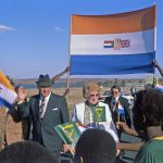 63398276-apartheid-flag-ruling-banned-1200x858