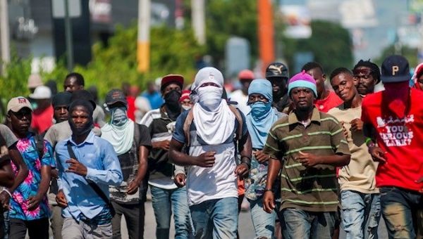 workersx_teachers_and_students_demand_the_resignation_of_president_jovenel_moise_in_puerto_principex_haitix_oct__28x_2019_.jpg_1718483346