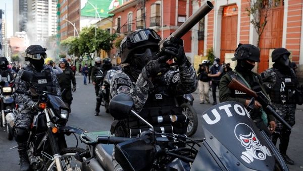 a_member_of_the_riot_police_aims_his_weapon_during_a_protestx_in_la_pazx_bolivia_november_21x_2019__2.jpg_1718483346