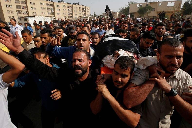 mourners_carry_the_body_of_palestinian_islamic_jihad_militant_abdullah_al-belbasi_during_his_funeral_in_the_northern_gaza_strip_november_13x_2019_