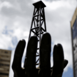 a_sculpture_is_seen_outside_a_building_of_venezuelaxs_state_oil_company_pdvsa_in_caracasx_venezuela_june_14x_2016_.png_1718483346