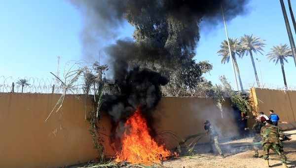 hashd_al-shaabi_fighters_set_the_u_s__embassy_wall_in_baghdadx_iraqx_dec__31x_2019_.jpg_1718483346