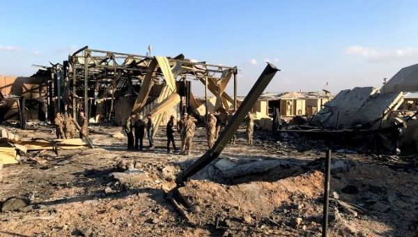 u_s__soldiers_inspect_the_site_where_an_iranian_missile_hit_at_ain_al-asad_air_base_in_anbar_provincex_iraq_january_13x_2020_.jpg_1718483346