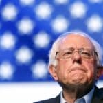 Democratic U.S. presidential candidate Bernie Sanders reacts as he speaks at a rally in Hollywood