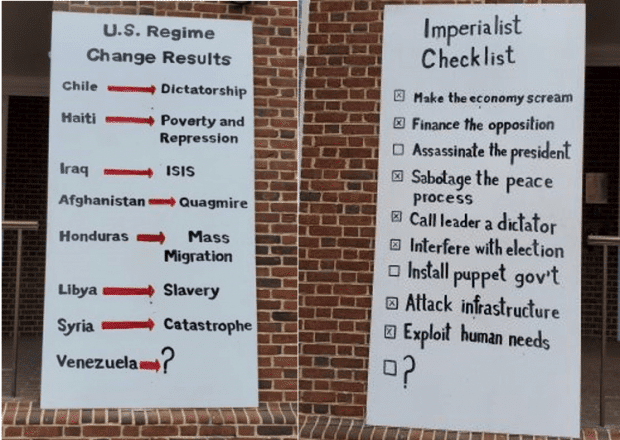embassy-protection-collective-two-placards-outside-the-embassy-e1581878268942