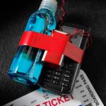 Airline ticket and boarding pass with handmade liquid terrorist bomb.