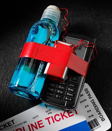 Airline ticket and boarding pass with handmade liquid terrorist bomb.