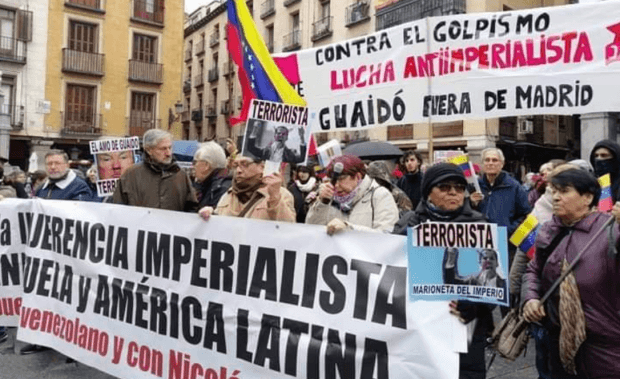 protesters-greet-guaido-in-spain-january-2020.-e1580532416892