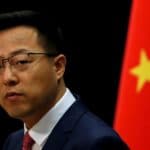 FILE PHOTO: Chinese Foreign Ministry spokesman Zhao Lijian attends a news conference in Beijing