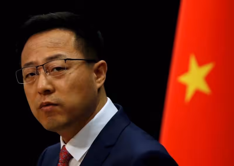 FILE PHOTO: Chinese Foreign Ministry spokesman Zhao Lijian attends a news conference in Beijing