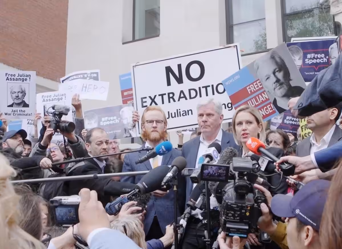 Press-scrum-outside-Westminster-with-WikiLeaks-and-Assange-team-no-2-min