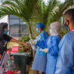 Venezuelans returning to their country from aruba.