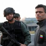 Featured image: Leopoldo Lopez leading a coup d'etat in April 2019, now living like royalty in Spain. File photo.