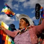 A supporter of former Bolivia's President Evo Morales participates in a demonstration in Cochabamba