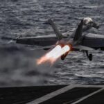 An F-18 takes off from the aircraft carrier USS Harry S. Truman as part of a US-led 'coalition' mission in Iraq and Syria, May 8, 2018.