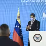 Nicolas Maduro wears a protective mask following a press conference at Miraflores Palace in Caracas on Feb. 17. Photographer: Carlos Becerra/Bloomberg