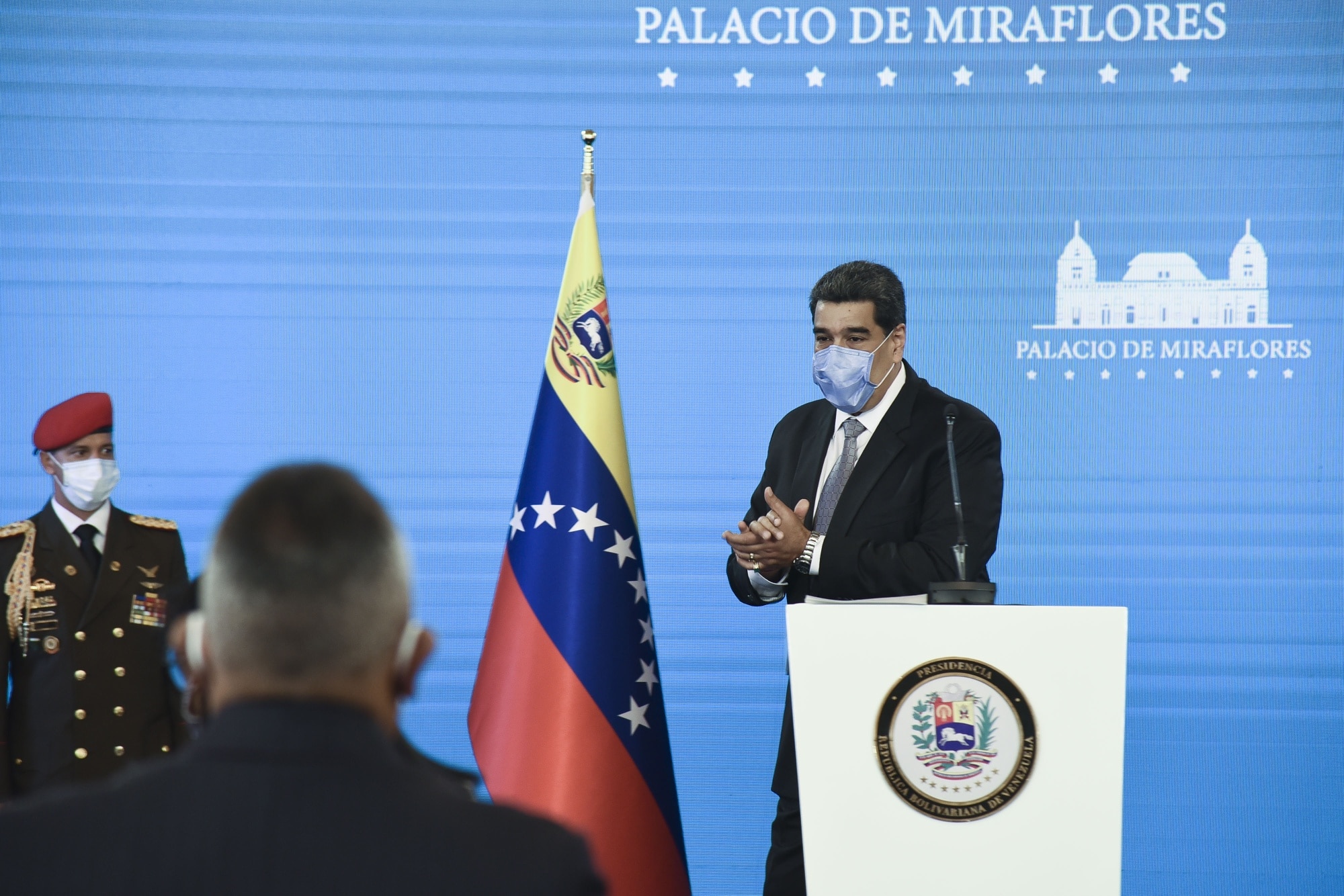 Nicolas Maduro wears a protective mask following a press conference at Miraflores Palace in Caracas on Feb. 17. Photographer: Carlos Becerra/Bloomberg