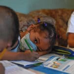 Featured image: Several children attend class in a homecare classroom in a house in the Petare neighborhood, Venezuela's largest slum, in Caracas, on September 16, 2020. © AFP.
