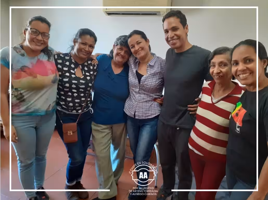 Featured image: Aryenis and Alfredo with their relatives at home under house arrest. Photo courtesy of @aryenisyalfredo.