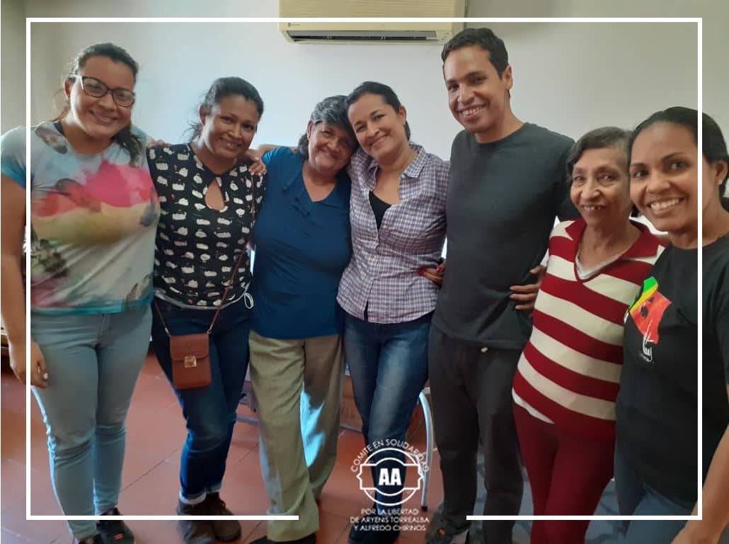 Featured image: Aryenis and Alfredo with their relatives at home under house arrest. Photo courtesy of @aryenisyalfredo.