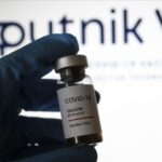 An illustration of the Sputnik V vaccine against the coronavirus that was developed by Russia. (Hakan Nural - Anadolu Agency).