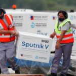 Featured image: Men unload the third batch of the Sputnik V vaccine that arrived in Buenos Aires on January 28. File photo by AP.