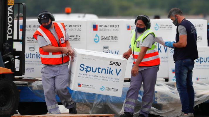 Featured image: Men unload the third batch of the Sputnik V vaccine that arrived in Buenos Aires on January 28. File photo by AP.