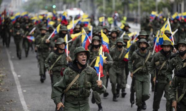 Military units and the Bolivarian National Guard of Venezuela participate in the military exercises called Bolivarian Shield Supreme Commander Hugo Rafael Chávez Frías 2021, in Caracas on March 5, 2021. (Photo by Yuri CORTEZ / AFP).