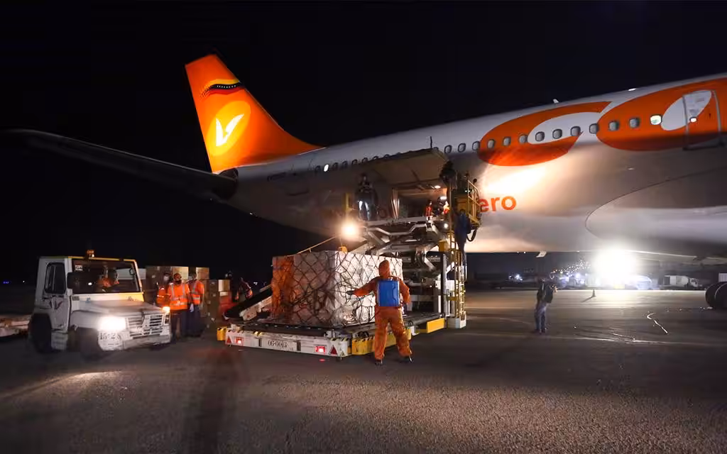 Featured image: Chinese anti Covid-19 vaccine being unloaded in Venezuela. Photo courtesy of @DrodriguezVen.