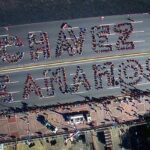 Featured image: Human sign made by 2,500 Venezuelan youths in 2013, a few days after Hugo Chavez passing. File photo.