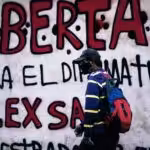 Featured image: Posters in the streets of Venezuela demanding Alex Saab's liberation.