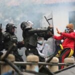 Featured image: Colombian police forces heavily repressing protesters during the Paro Civico in Bogota 28/04/2021. REUTERS/Luisa Gonzalez .