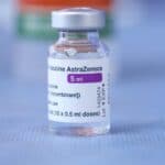 Featured image: A vial of AstraZeneca COVID-19 vaccine on a table, Wednesday, March 24, 2021. AP.