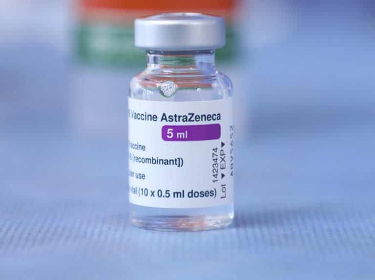 Featured image: A vial of AstraZeneca COVID-19 vaccine on a table, Wednesday, March 24, 2021. AP.