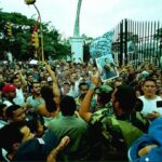 Featured image: Venezuelan Chavistas in front of Miraflores Palace demanding the return of President Chavez. File photo.