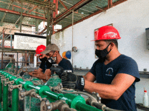 Featured image: Workers reopening an oxygen plant in Miranda state, Venezuela to tackle oxygen demand due to COVID-19 spike. Photo courtesy of Miranda state Governor.