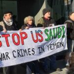 Brian Terrell at left, with Joan Pleune, Felton Davis and Bud Courtney, blocking the US Mission to the UN, December, 2017, by Joanne Kennedy