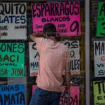Featured image: A man observes inside a display case from which posters with food prices are strained in Caracas (Venezuela). EFE / Miguel Gutiérrez / Archive.
