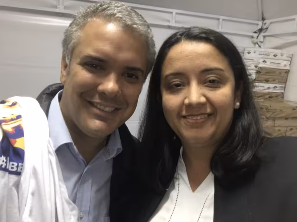 Gaby Arellano and the Colombian president Ivan Duque carrying a tshirt with the face of Leopoldo Lopez. File photo.