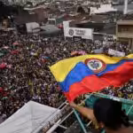 Featured image: Protesters participate in a protest against the Government of Colombian President Iván Duque in Cali, May 19, 2021. (Photo: AFP).