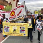 The president of the union (center), Andres Francoise, marching in Boston hanging a yellow sing in support of President Maduro. Photo courtesy of USW Local 8751.