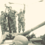 Featured image: General Garcia Carneiro talking to the Chavista mass of people that went to Fuerte Tiuna in Caracas demanding the return of Hugo Chavez during the 2002 coup d'etat. File photo.