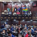 Featured image: The LGBTQ flag raised on Venezuelan National Assembly. Photo courtesy of @VE_Igualitaria .